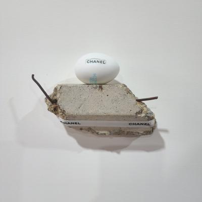 Landscape, 2025, eggshell, thrown away items & mixed media, 19 x 12,5 x 5 cm