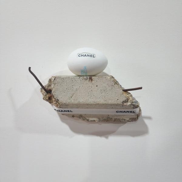 Landscape, 2025, eggshell, thrown away items & mixed media, 19 x 12,5 x 5 cm